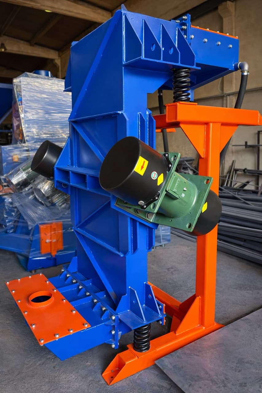 Spring-mounted vibratory unit in the workshop