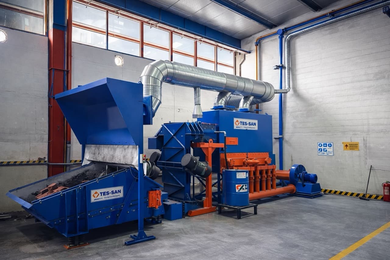 Shakeout unit and dust extraction line